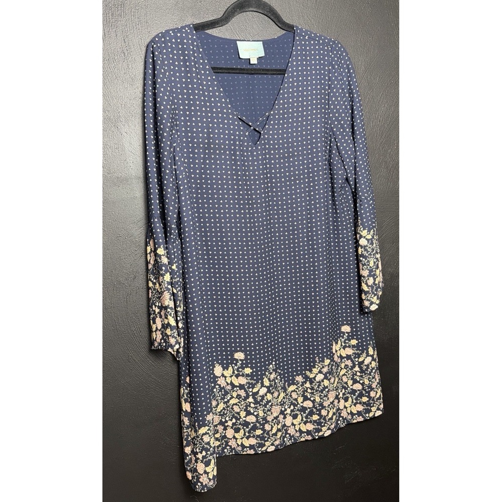 Skies are blue Navy blue polka dot dress with 3/4 sleeves and V-neckline. Size L